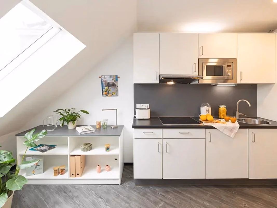 Kitchen?w=400&h=260&fit=crop&q=40&auto=format&trim=auto